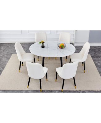 Table and chair set.Modern Extendable MDF Dining Table.The table has a telescopic design, suitable for gatherings of different size.Paired with 6 chairs with PU cushions and black metal legs.