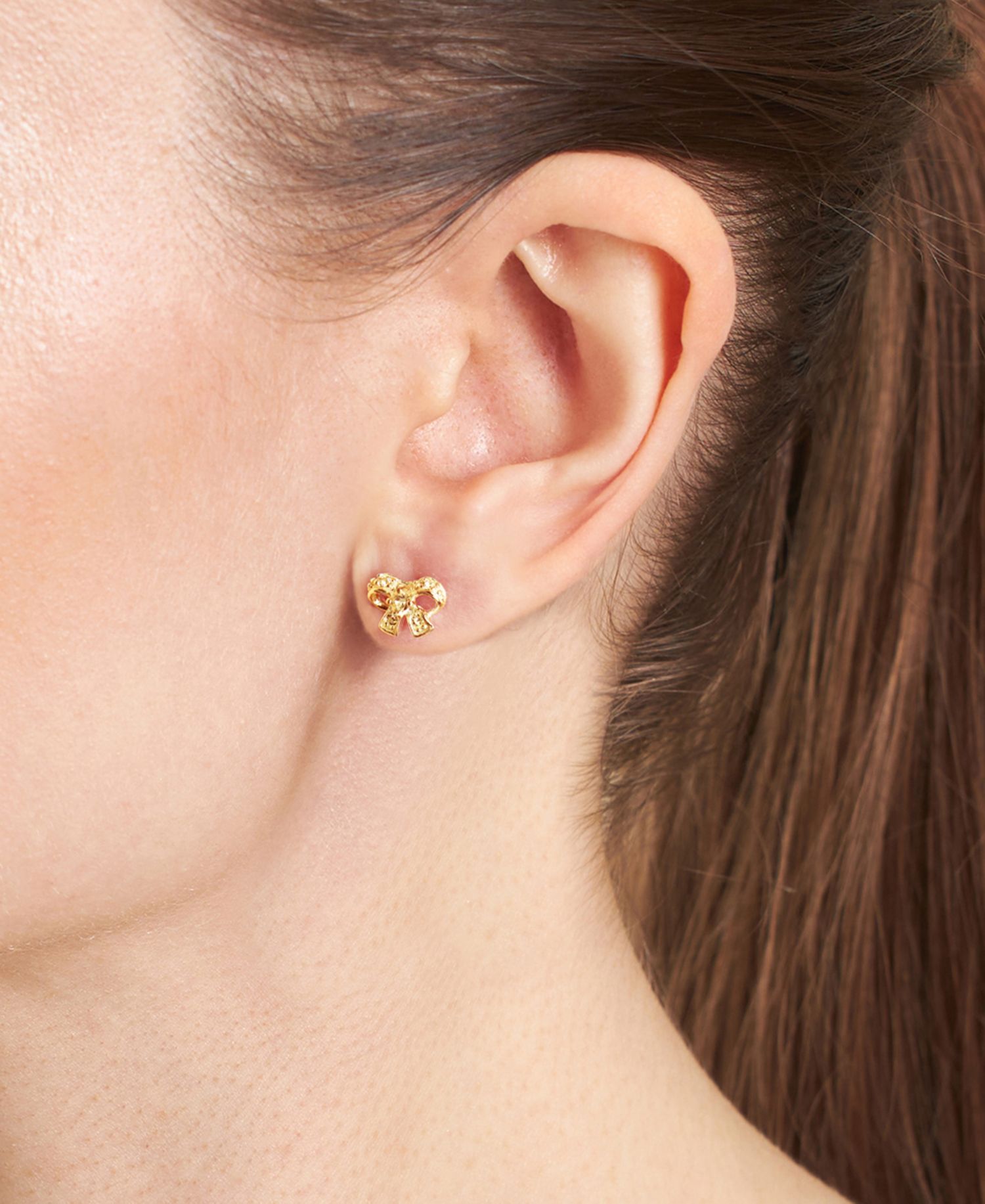 Cubic Zirconia (1/4 ct. t.w.) Bow Post Earrings in Sterling Silver (Also Available in 14k Gold over Sterling Silver)