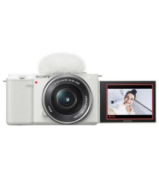 Sony ZV-E10 APS-C Mirrorless Interchangeable Lens Vlogging Camera with 16-50mm Lens, White - Bundle with Sony ACCVC1 Vlogger Accessory Kit
