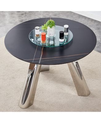 Streamdale A 42-inch burn stone round table with stainless steel legs can accommodate 4 or 6 diners