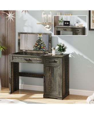 Vanity desk with mirror and storage drawers.