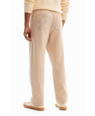 Men's Trousers with floral details