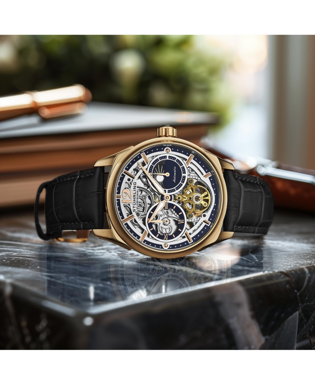 Stuhrling Vanguard 1019.04 Legacy Collection Dual Time Automatic Skeleton Watch 42mm Rose Gold Tone Black Dial Leather Strap