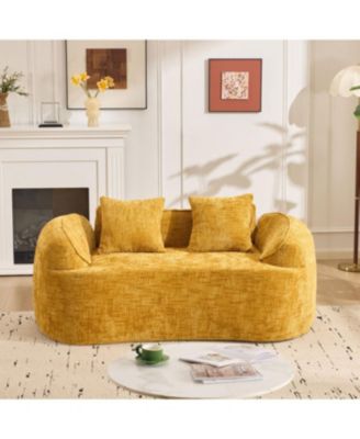 Streamdale Yellow curved two-person sofa with armrests and two pillows