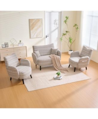 Modern two-seater sofa with armrests, pillows, and storage pockets.