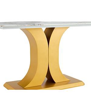 A modern minimalist dining table. Imitation marbled glass tabletop. Gold MDF table legs for kitchen and living room