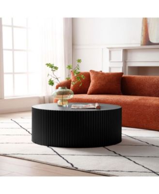 Sleek and Modern Round Coffee Table with Eye-Catching Relief Design Black