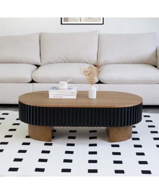 Elliptical coffee table with storage