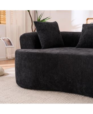 Crescent-shaped, modern self-inflating two-seater sofa with deep cushions