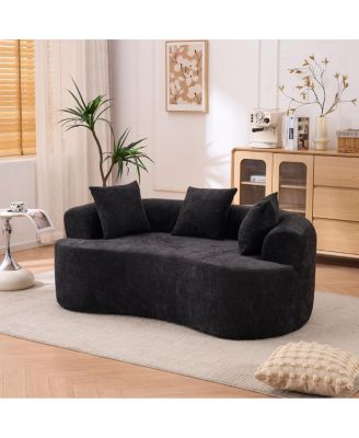 Crescent-shaped, modern self-inflating two-seater sofa with deep cushions