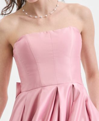 Juniors Strapless Satin Gown with Pleated Skirt and Back Bow Detail
