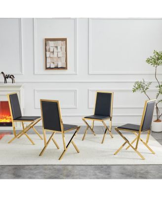 4-pack gold metal framed black PU dining chairs with ergonomic design.