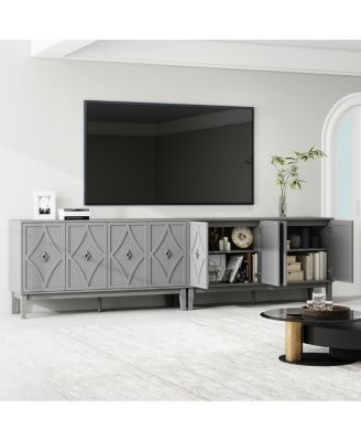 Vintage 4-door cabinet with hand-carved geometric doors and adjustable shelves