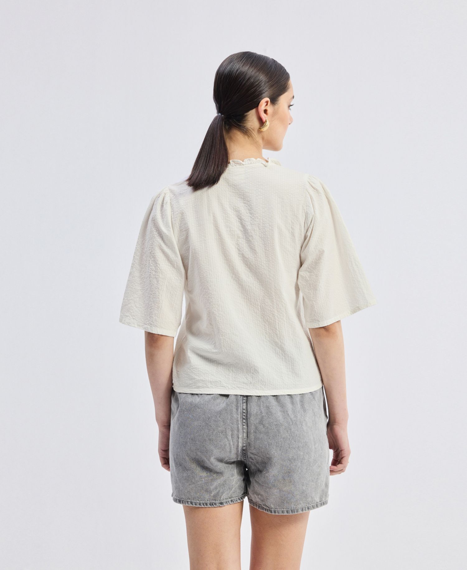 Women's Relaxed Fit Top With Ruffles and Front-Ties in Cream