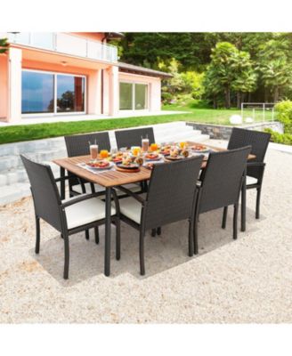 7 Piece Outdoor Wicker Dining Set with 63 in Acacia Wood Table, Umbrella Hole and 6 Cushioned Chairs