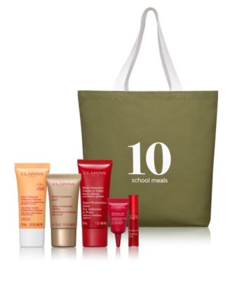 Free 6-Pc. gift with a Clarins purchase of $85 or more, and feed 10 meals through Mary's Meals