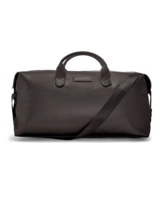 Free Vince Camuto Duffle Bag with a $94 Vince Camuto Men's Collection Purchase.