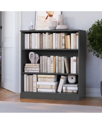 Dark gray/charcoal 3-shelf freestanding bookcase with books and decor.