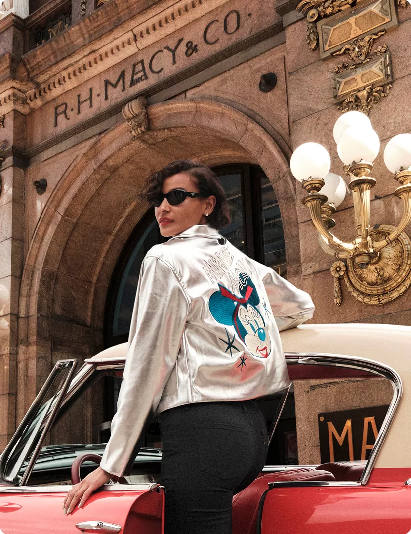A metallic jacket with a graphic back