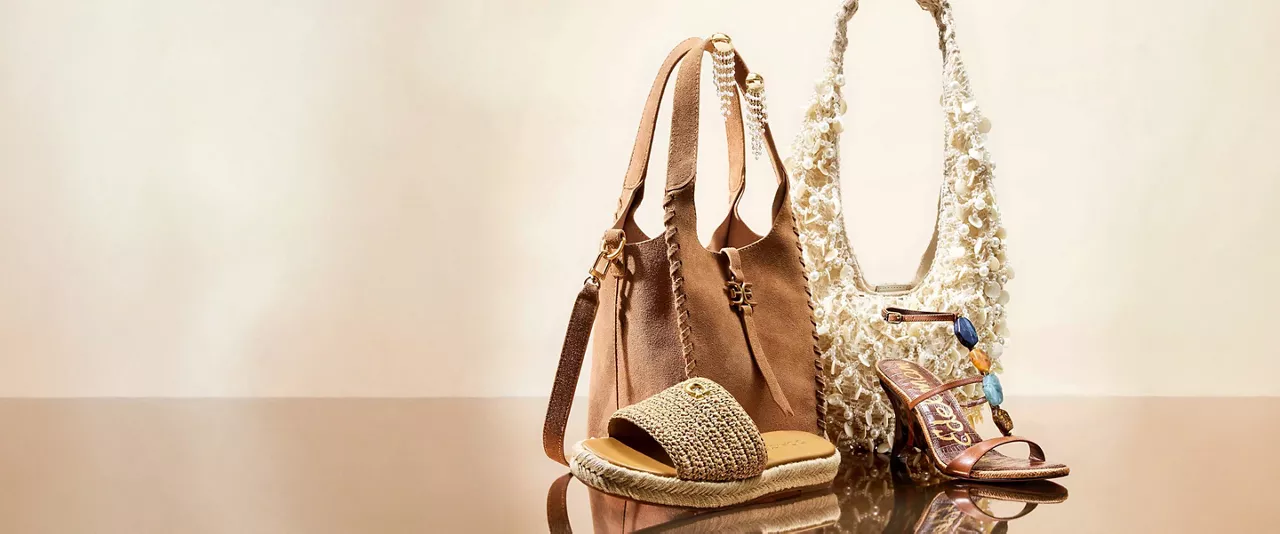 Artisan-inspired accessories featuring woven fabrics, beading & earthy embellishments.