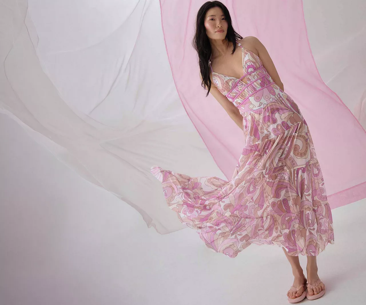 Meet the modern mermaid: sorbet hues blend with sheer fabrics, swirling prints, and sea-inspired finishes.